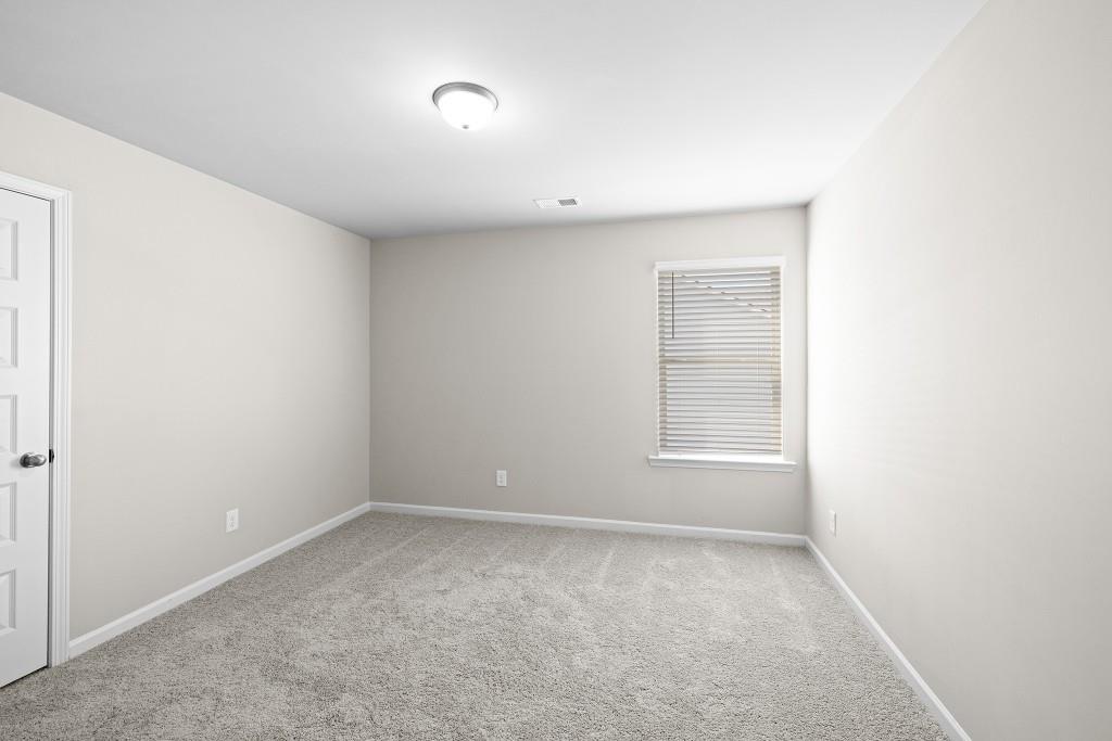7 Purackal Lane Statham, GA 30666 - Photo 41 of 57 an empty room with a window