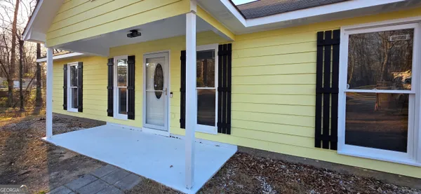 a front view of a house with shower