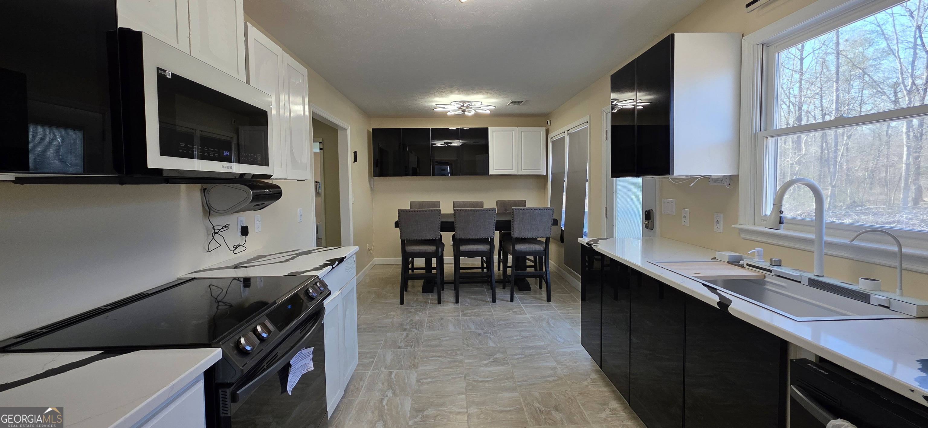 225 Lee Road Smiths Station, AL 36877 - Photo 27 of 49 View kitchen and dining area
