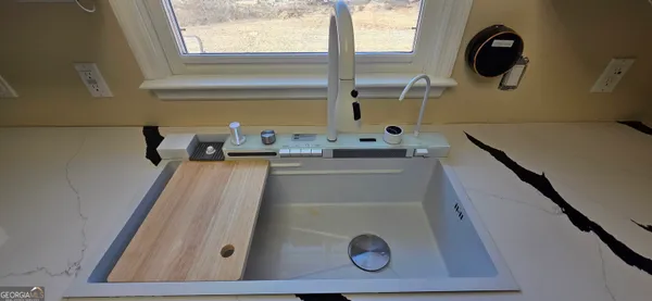 a bathroom with a sink and a toilet
