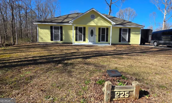a view of a house with a swimming pool