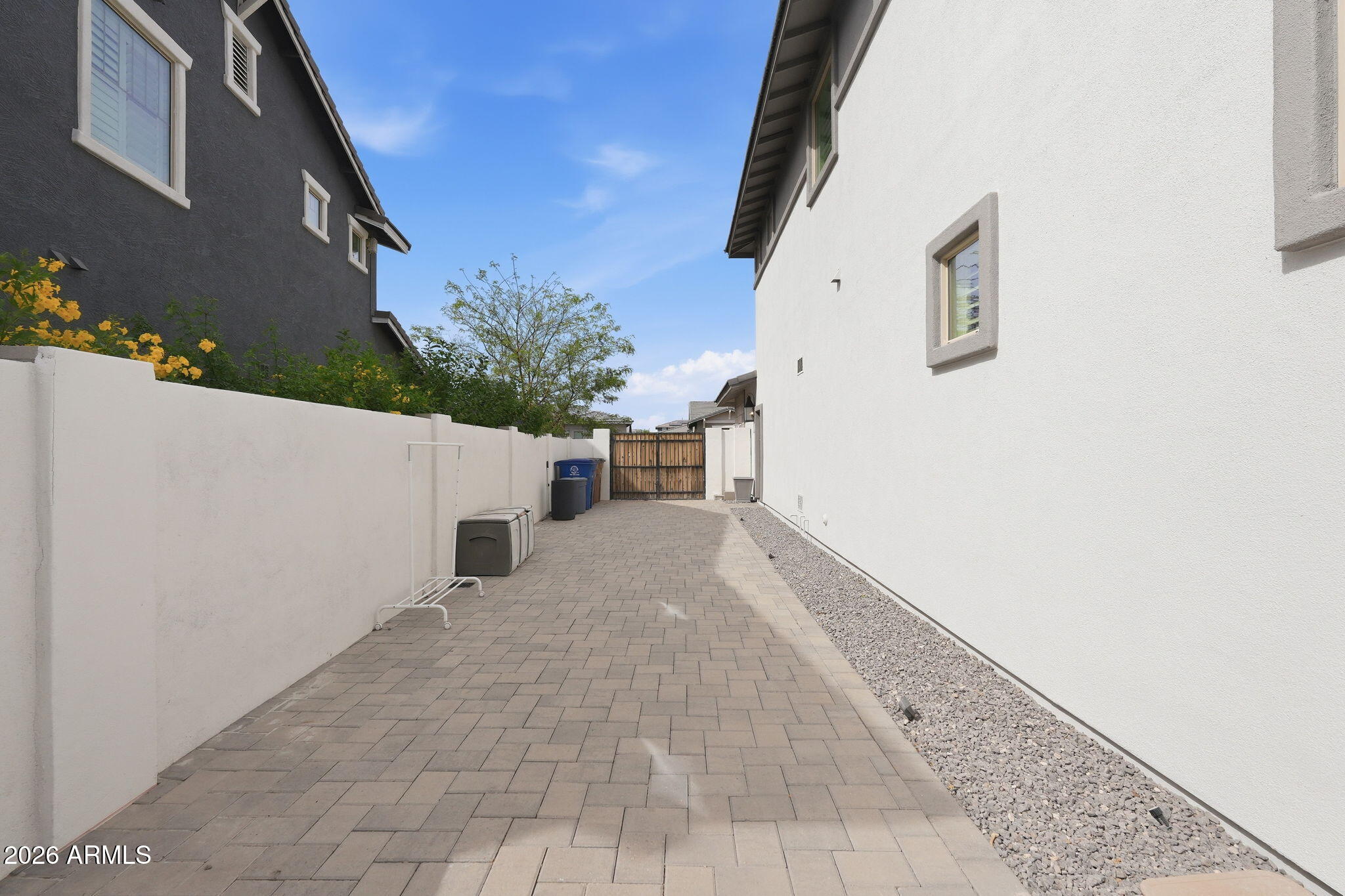 22607 East Russet Road Queen Creek, AZ 85142 - Photo 46 of 64 side yard pavers