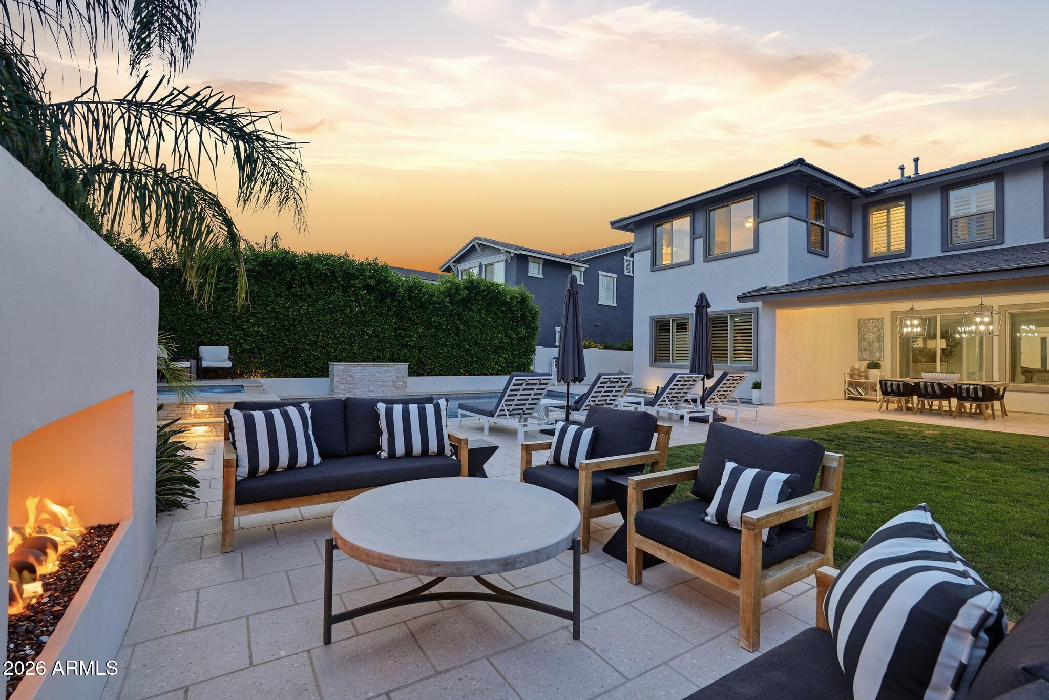 22607 East Russet Road Queen Creek, AZ 85142 - Photo 54 of 64 backyard gas fireplace sitting area