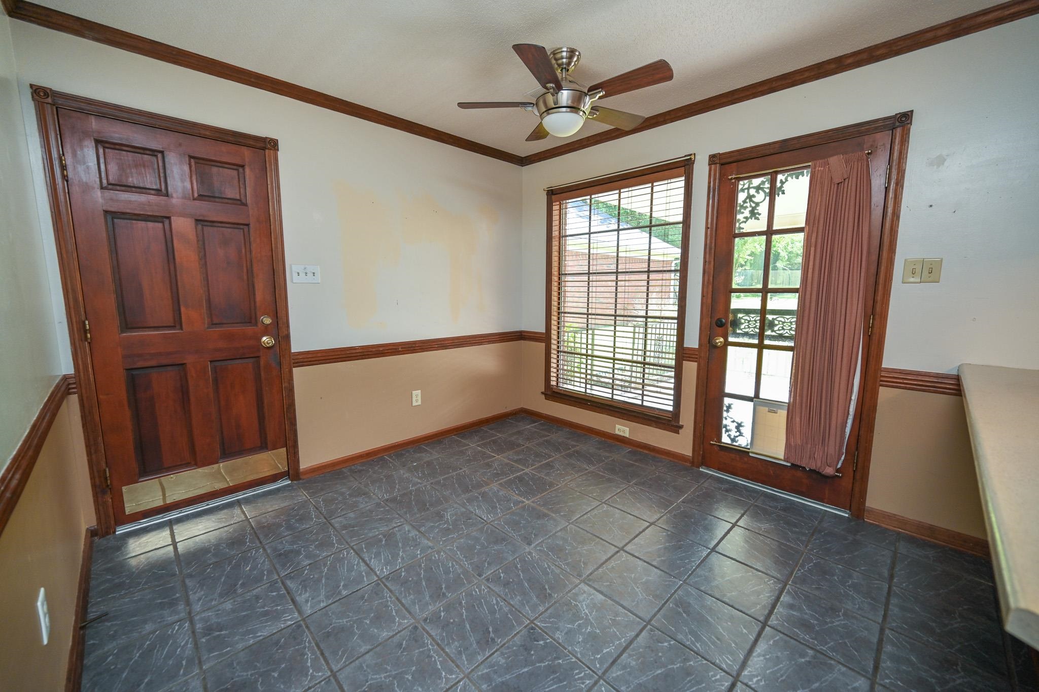 3746 Broadway Road Bartlett, TN 38135 - Photo 14 of 39 Doors lead to garage and back covered patio.
