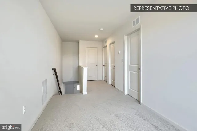 a view of a room with an empty space