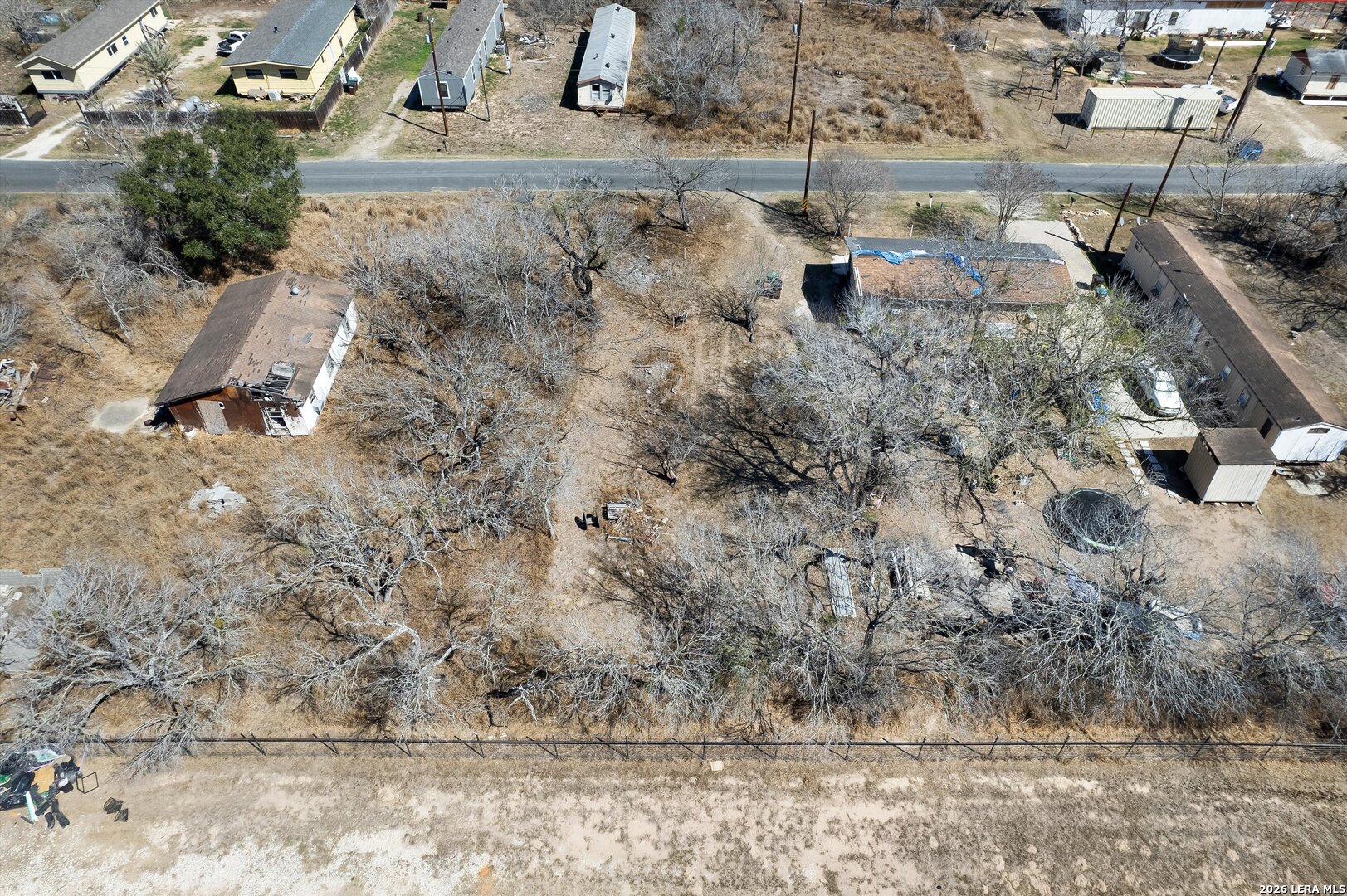 18829 Lagloria Road Elmendorf, TX 78112 - Photo 11 of 11 an aerial view of residential house with outdoor space