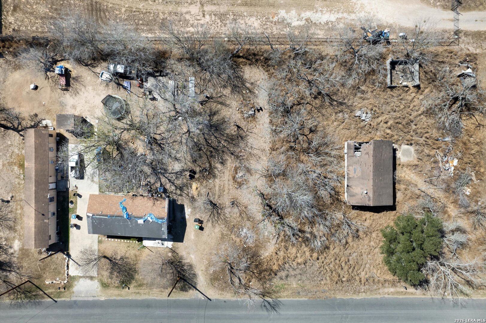 18829 Lagloria Road Elmendorf, TX 78112 - Photo 4 of 11 an aerial view of a house with a yard