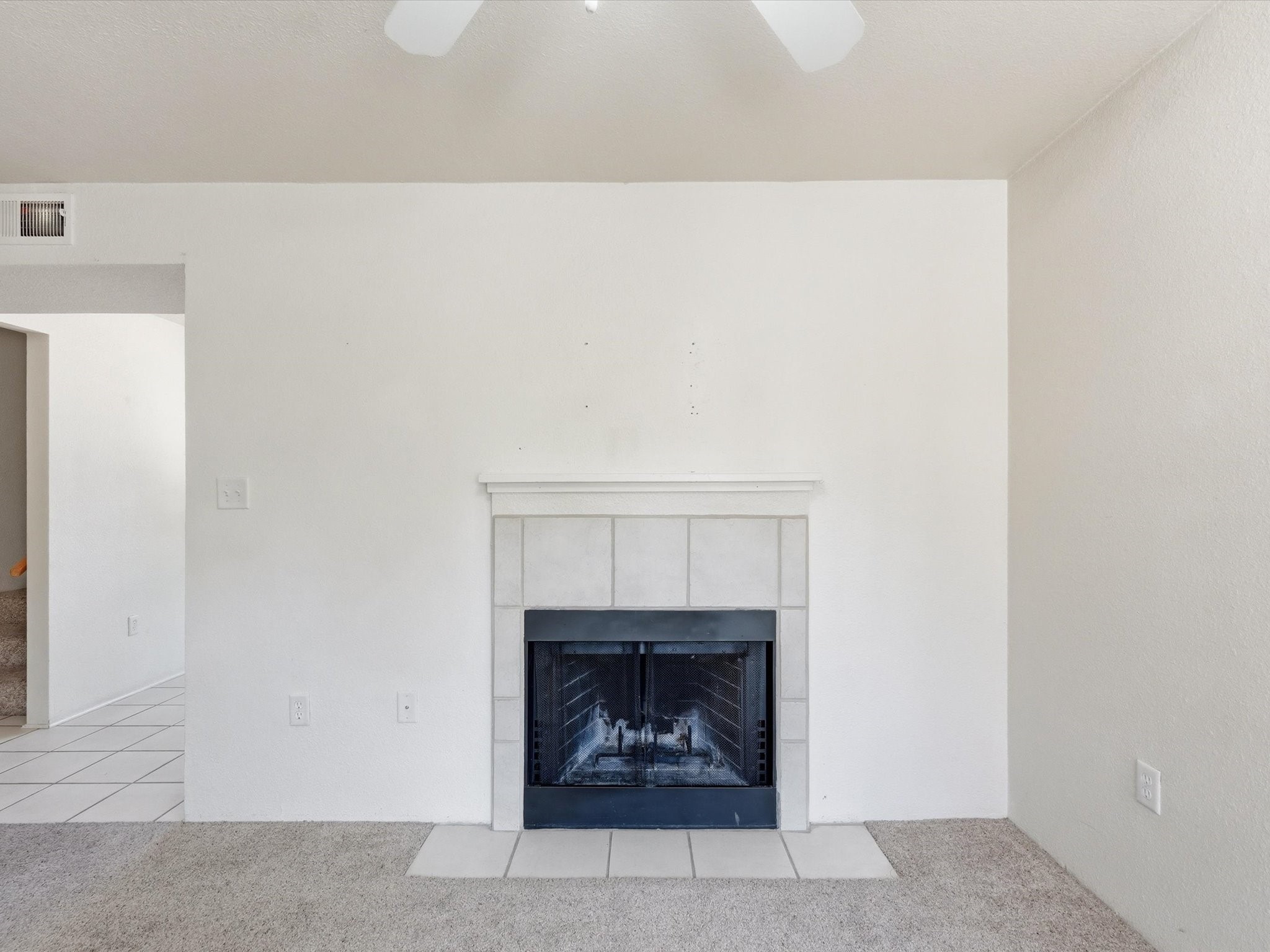 2210 Miguel Chavez Road, Unit 411 Santa Fe, NM 87505 - Photo 16 of 59 The living area with fireplace