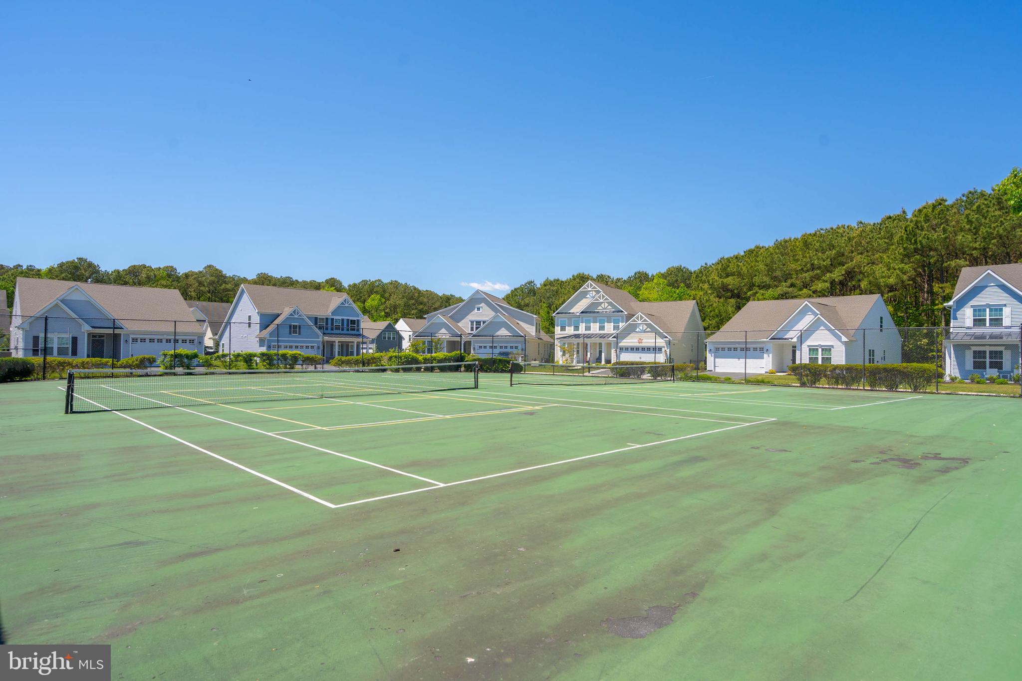 12159 Snug Harbor Road Berlin, MD 21811 - Photo 65 of 72 a view of an outdoor space and tennis court