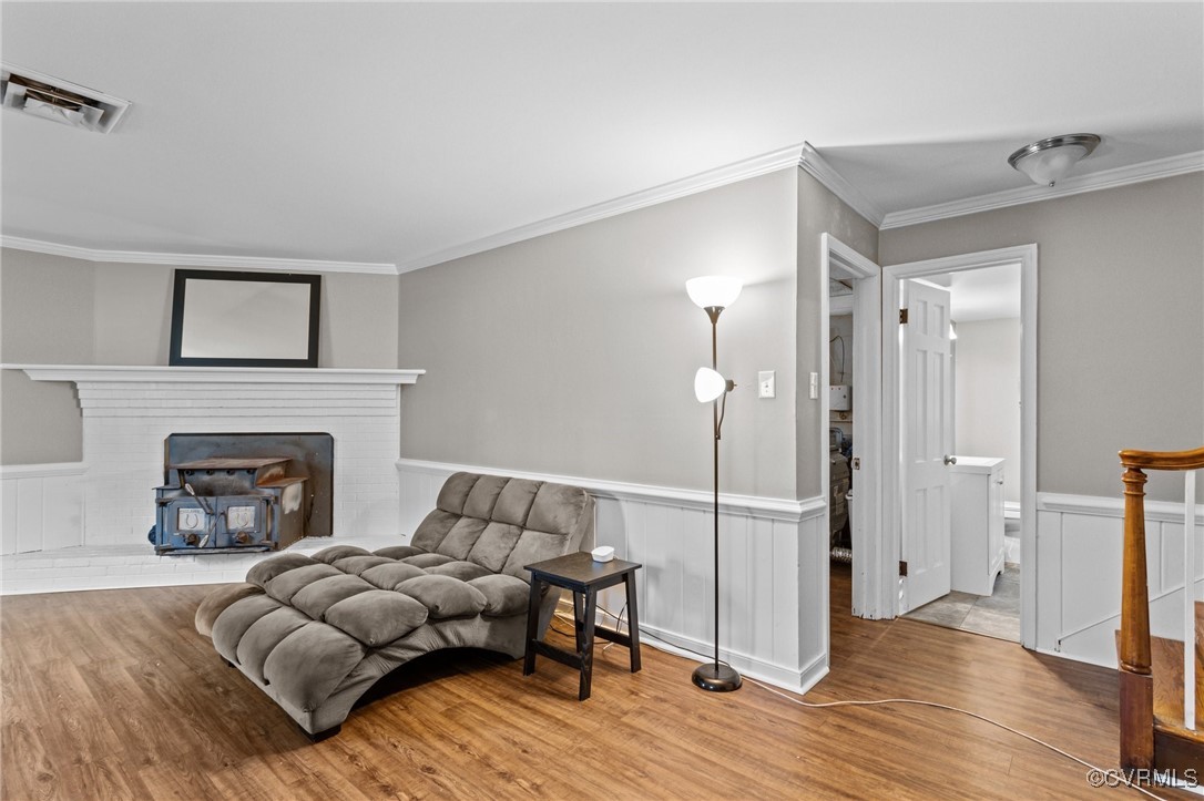 10507 Gayton Road Henrico, VA 23238 - Photo 24 of 47 Living area with crown molding, wood finished floo