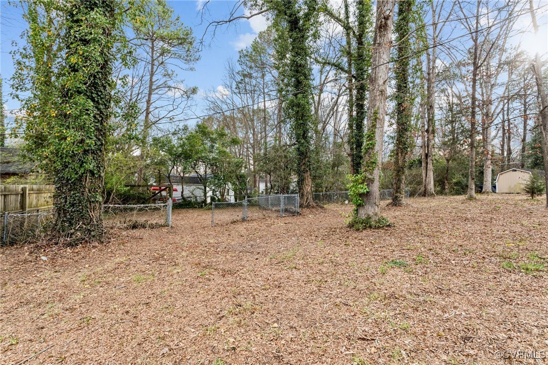 10507 Gayton Road Henrico, VA 23238 - Photo 36 of 47 View of yard with an outbuilding, a storage shed,