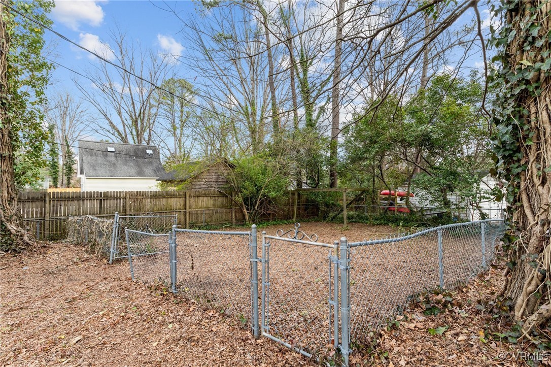 10507 Gayton Road Henrico, VA 23238 - Photo 38 of 47 View of yard featuring a fenced backyard and a gat