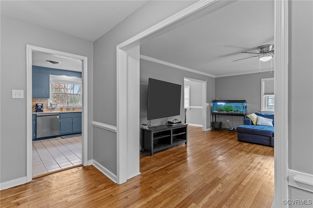 10507 Gayton Road Henrico, VA 23238 - Photo 5 of 47 Living area with crown molding, a ceiling fan, bas