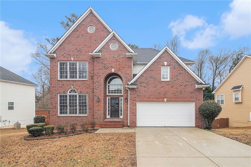 675 Pathwood Lane Stockbridge, GA 30281 - Photo 1 of 1 a front view of a house with a yard