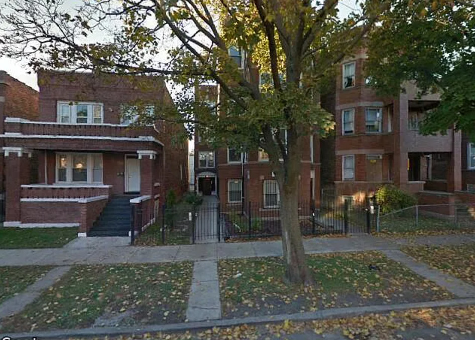 6928 South Green Street, Unit 1S Chicago, IL 60621 - Photo 1 of 12 a front view of a house with garden