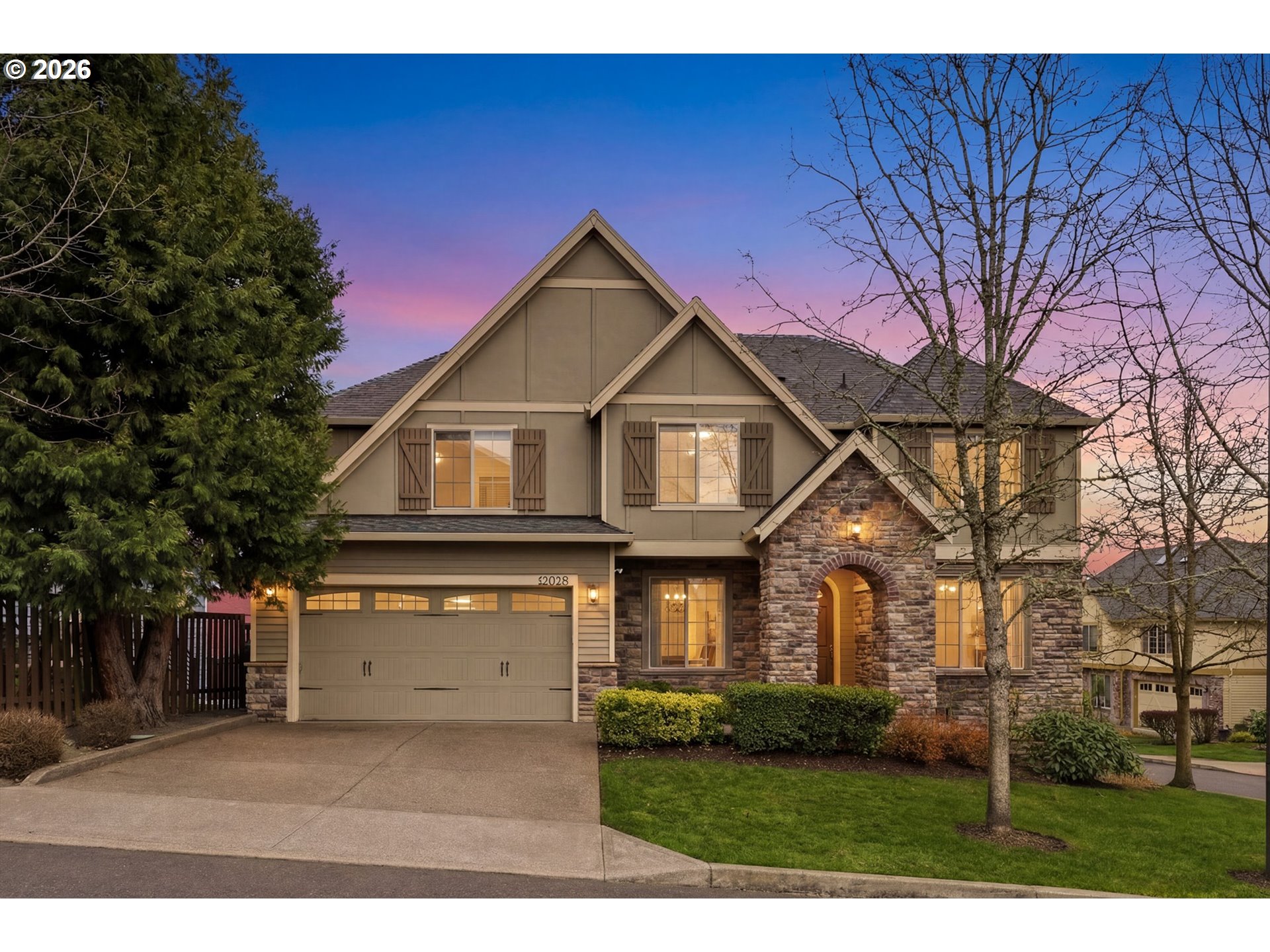 12059 Southwest Stringer Lane Tigard, OR 97224 - Photo 1 of 41 a front view of a house with a yard