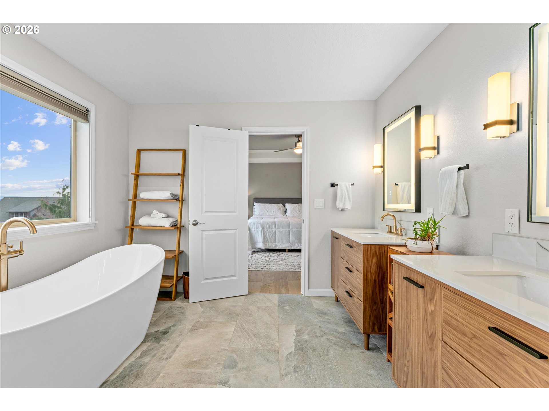 12059 Southwest Stringer Lane Tigard, OR 97224 - Photo 18 of 41 a bathroom with a granite countertop sink mirror bathtub and toilet