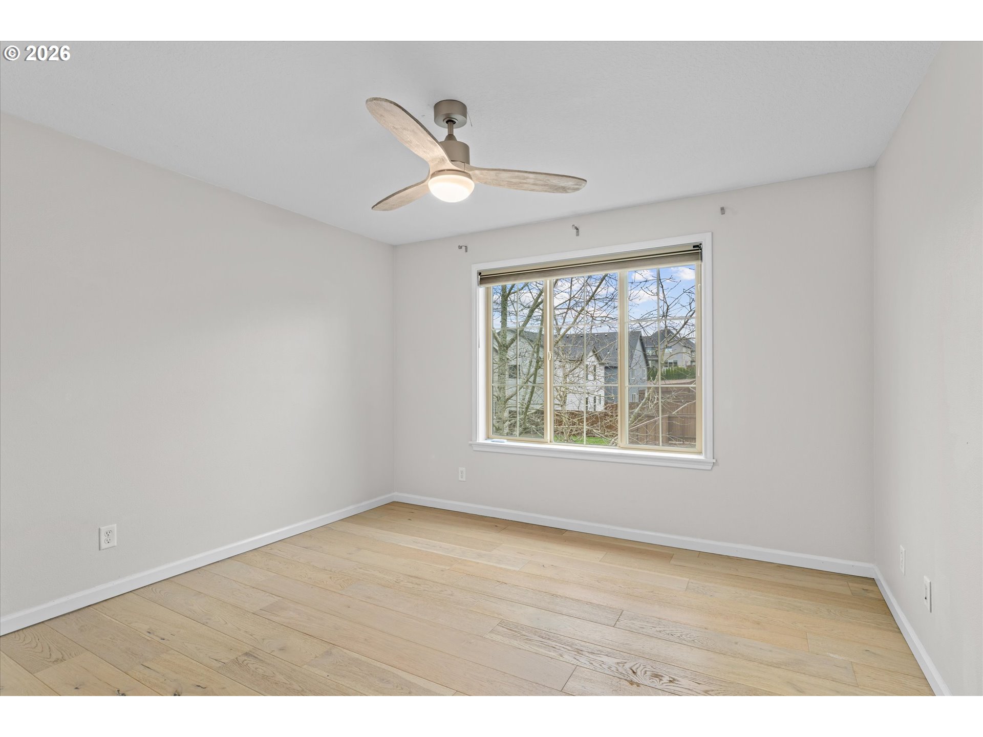 12059 Southwest Stringer Lane Tigard, OR 97224 - Photo 28 of 41 a view of an empty room with a window
