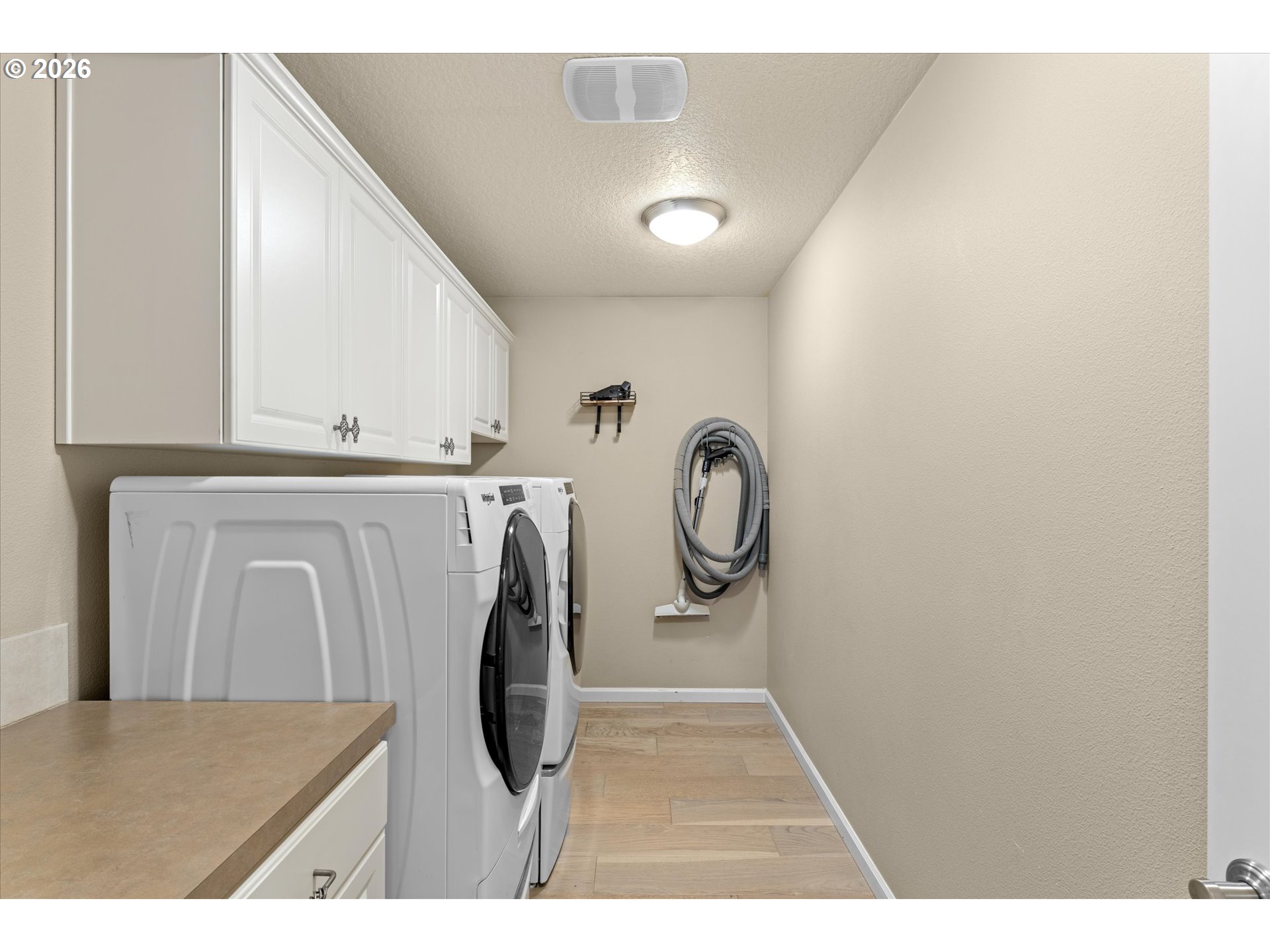 12059 Southwest Stringer Lane Tigard, OR 97224 - Photo 29 of 41 a utility room with dryer and washer