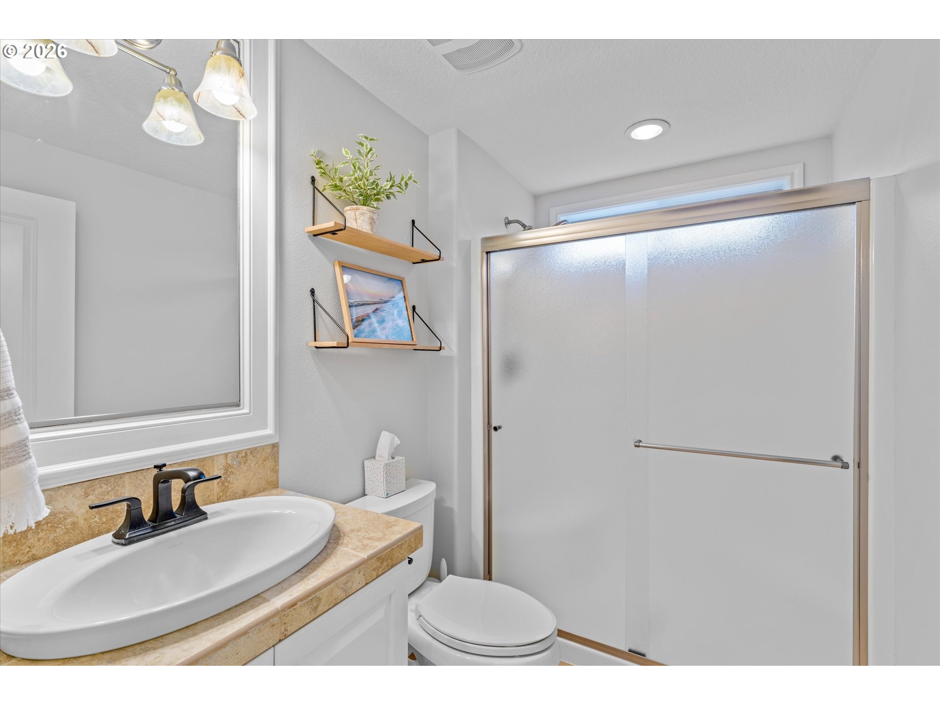 12059 Southwest Stringer Lane Tigard, OR 97224 - Photo 32 of 41 a bathroom with a sink toilet and shower