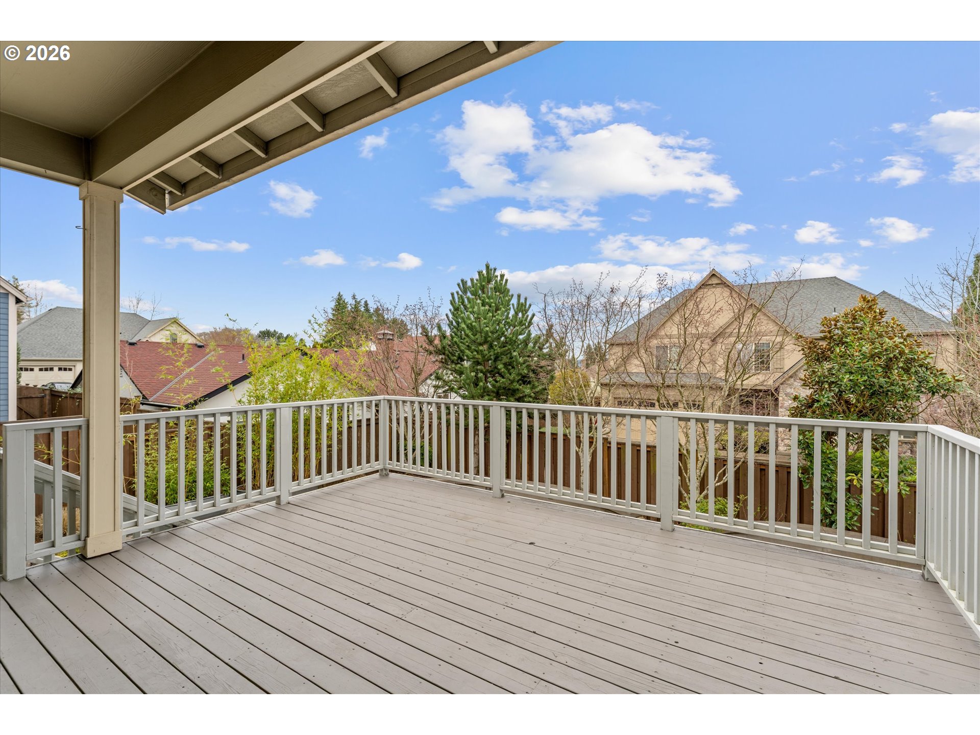 12059 Southwest Stringer Lane Tigard, OR 97224 - Photo 34 of 41 a view of balcony with wooden floor and fence