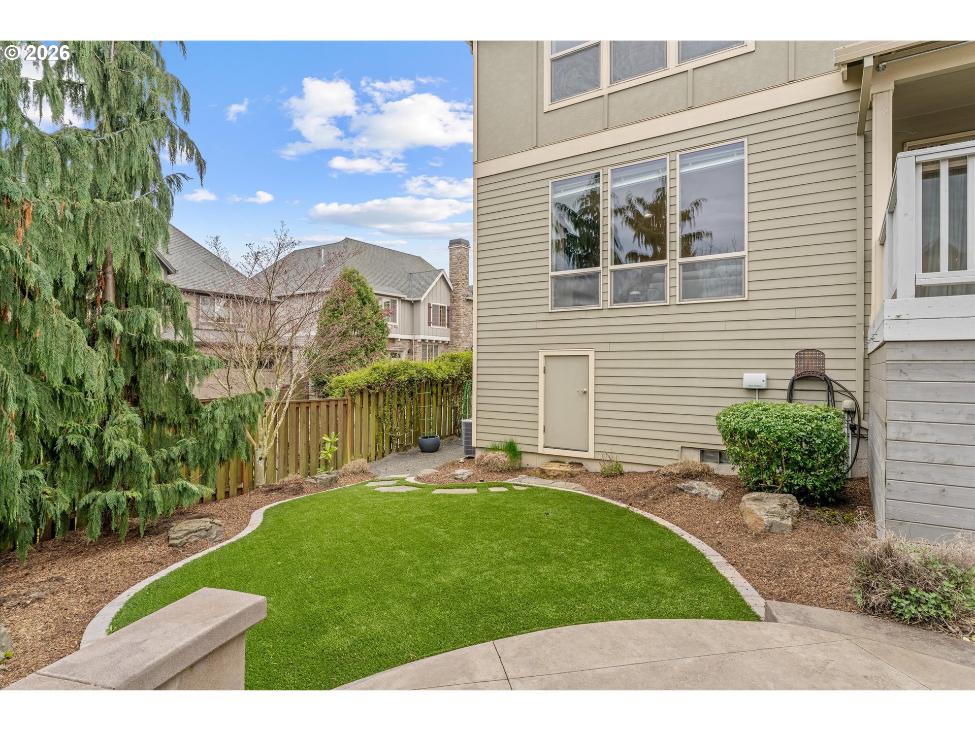 12059 Southwest Stringer Lane Tigard, OR 97224 - Photo 38 of 41 a view of a house with a garden