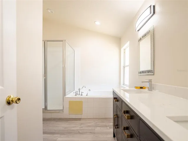 an empty room with a empty space and windows