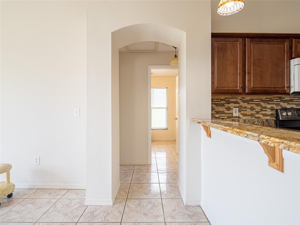 6569 Long Breeze Road Orlando, FL 32810 - Photo 10 of 31