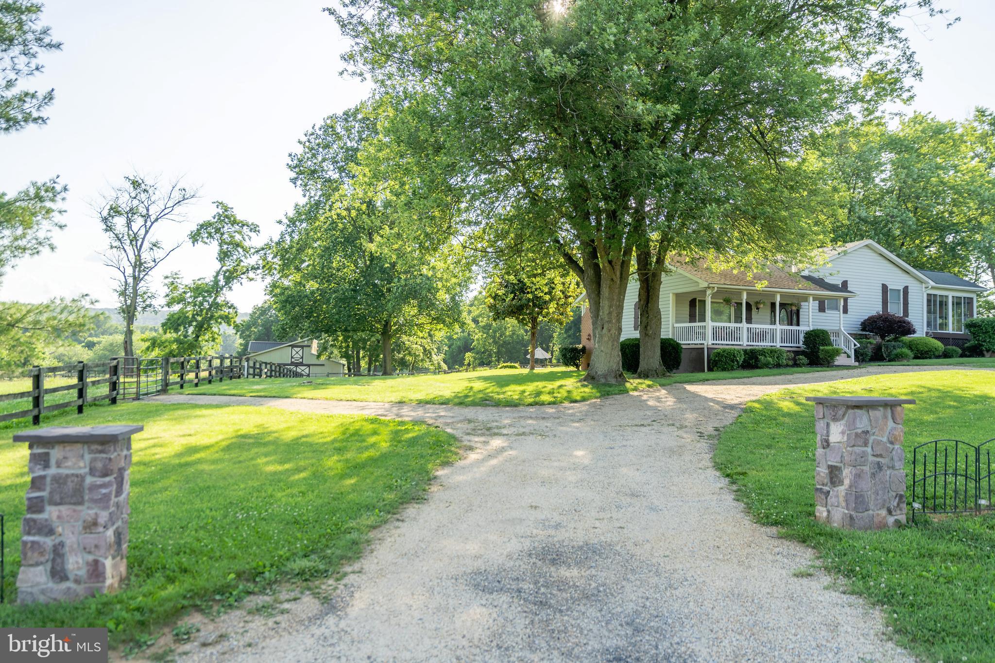 Stone Pillars that Frame the Driveway