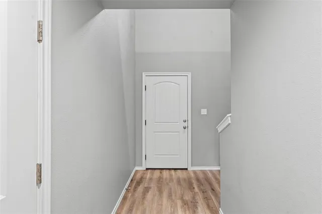 a view of kitchen with wooden floor
