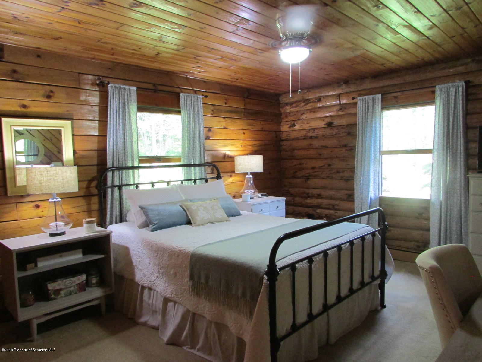 266 Brown Road Montrose, PA 18801 - Photo 22 of 47 a bedroom with a bed and a window