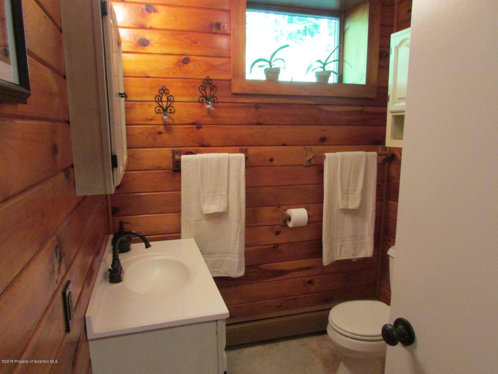 266 Brown Road Montrose, PA 18801 - Photo 25 of 47 a bathroom with a toilet and a sink
