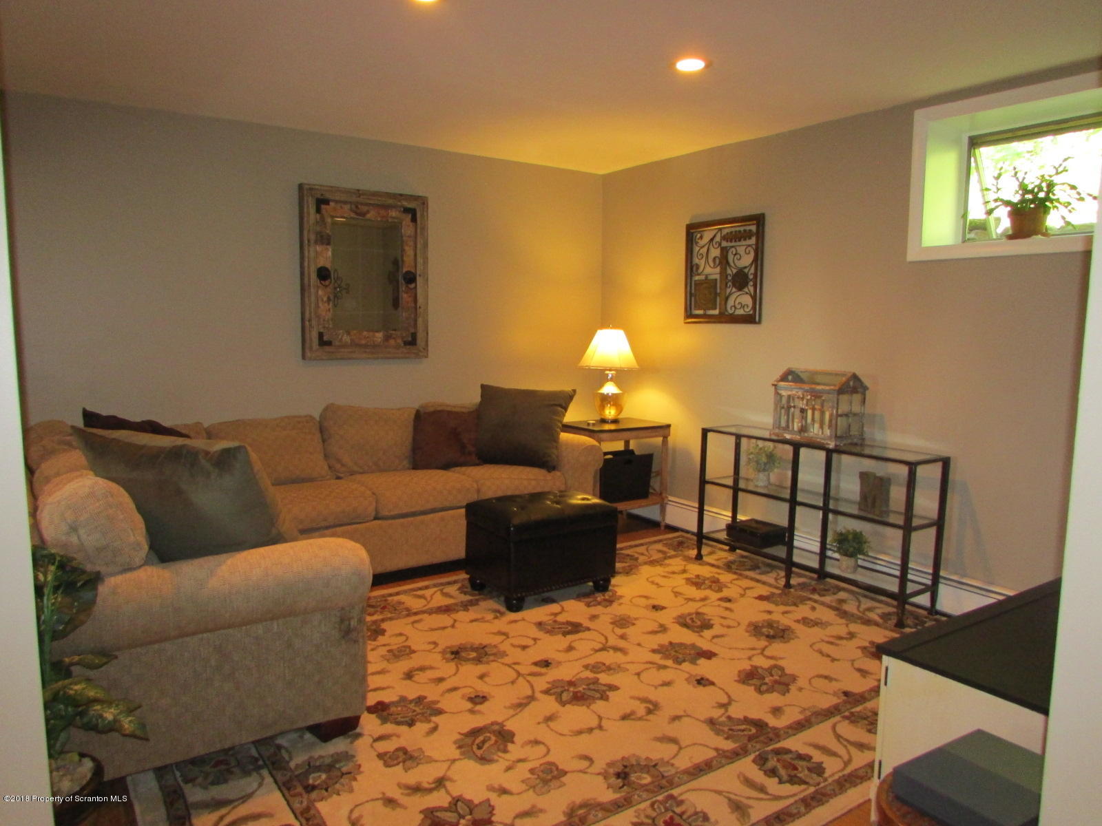 266 Brown Road Montrose, PA 18801 - Photo 29 of 47 a living room with furniture and a rug