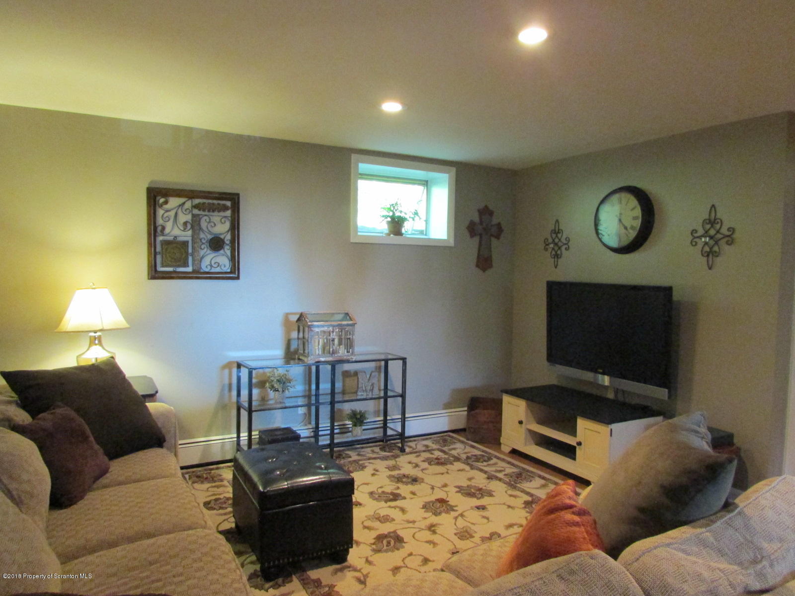 266 Brown Road Montrose, PA 18801 - Photo 30 of 47 a living room with furniture and a flat screen tv