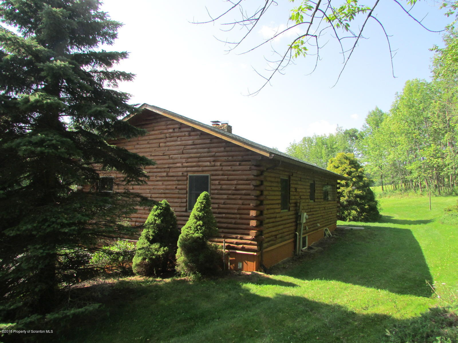 266 Brown Road Montrose, PA 18801 - Photo 47 of 47 a backyard of a house with lots of green space