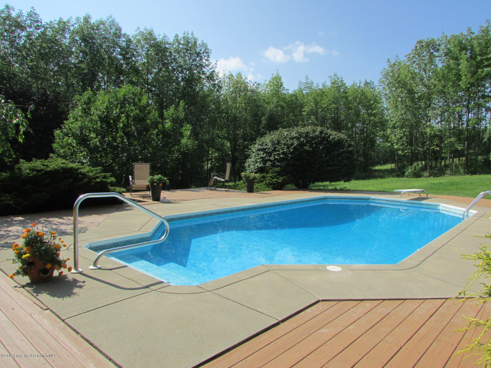 266 Brown Road Montrose, PA 18801 - Photo 5 of 47 a view of a swimming pool with a yard