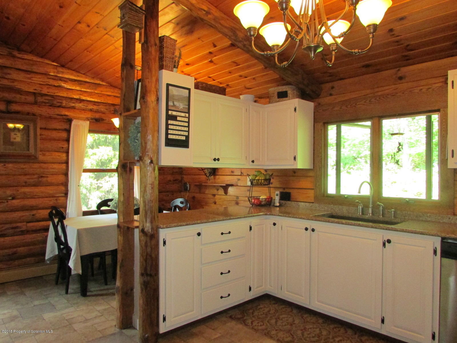 266 Brown Road Montrose, PA 18801 - Photo 10 of 47 a kitchen with a sink and cabinets
