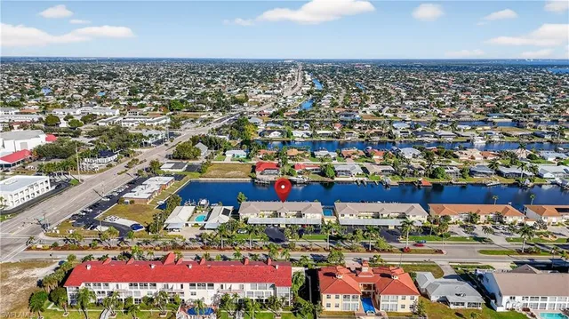 an aerial view of a building with outdoor space