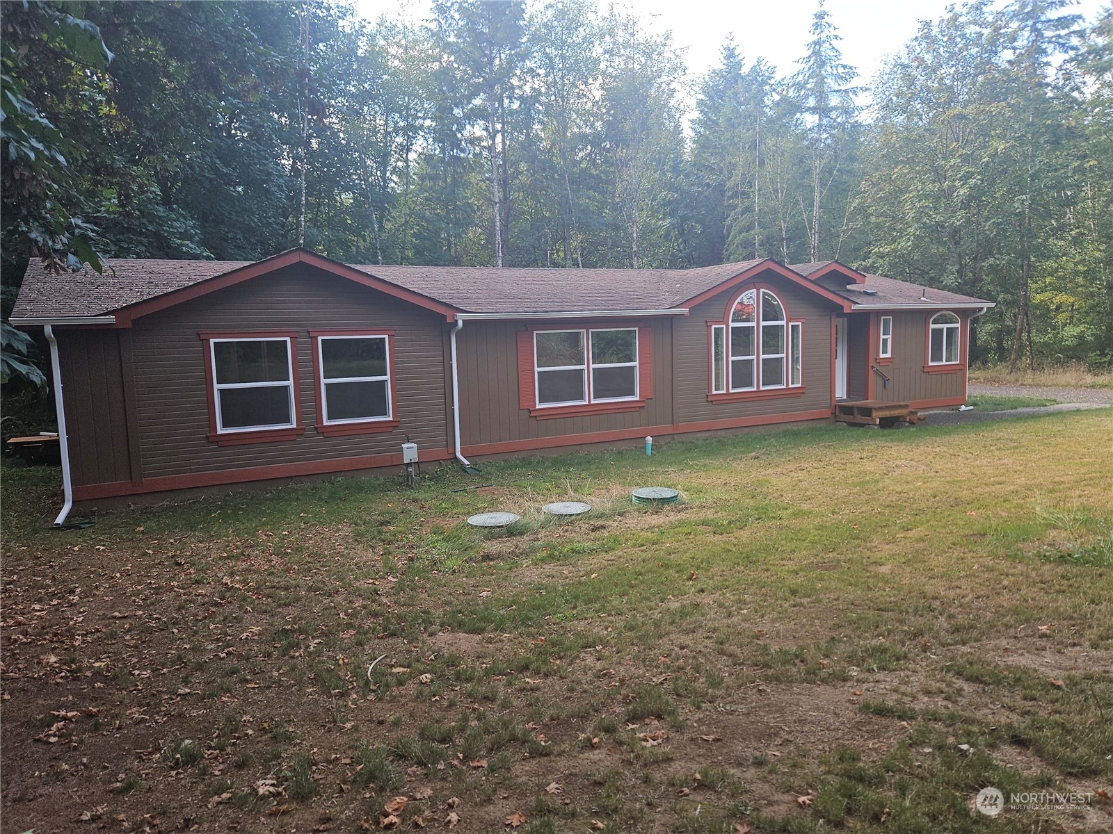 231 Avery Road West Winlock, WA 98596 - Photo 1 of 16 a view of a house with a yard