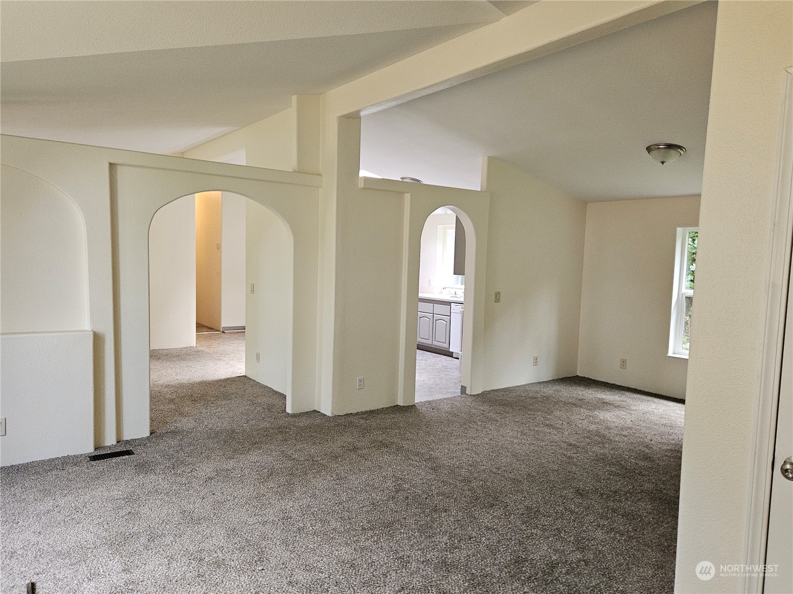 231 Avery Road West Winlock, WA 98596 - Photo 2 of 16 an empty room with windows and closet