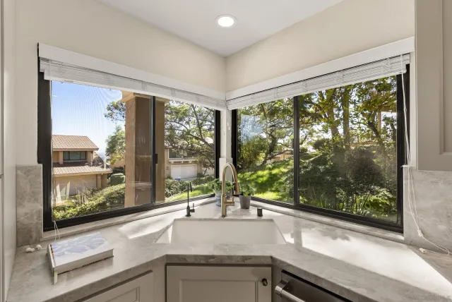 a view of a living room and window
