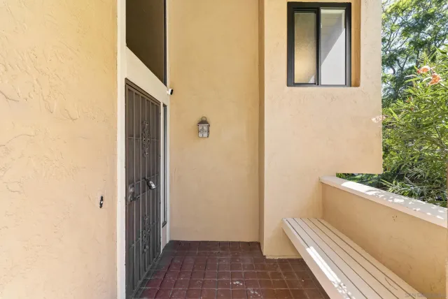 a view of a house with a door and chair