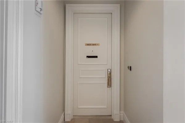 a bed room with a bed and a window