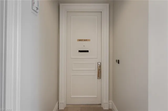 a bed room with a bed and a window