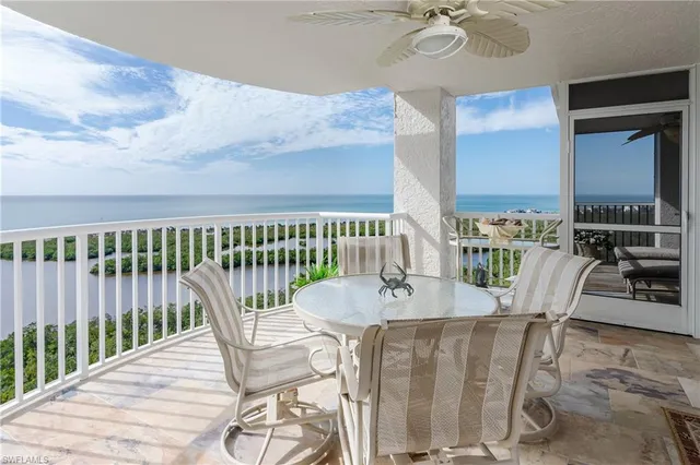 a view of balcony with seating space and plants