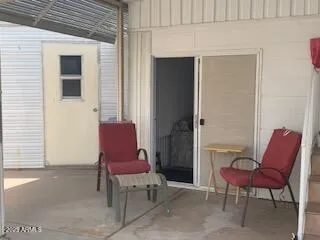 a outdoor space with a couch and chair