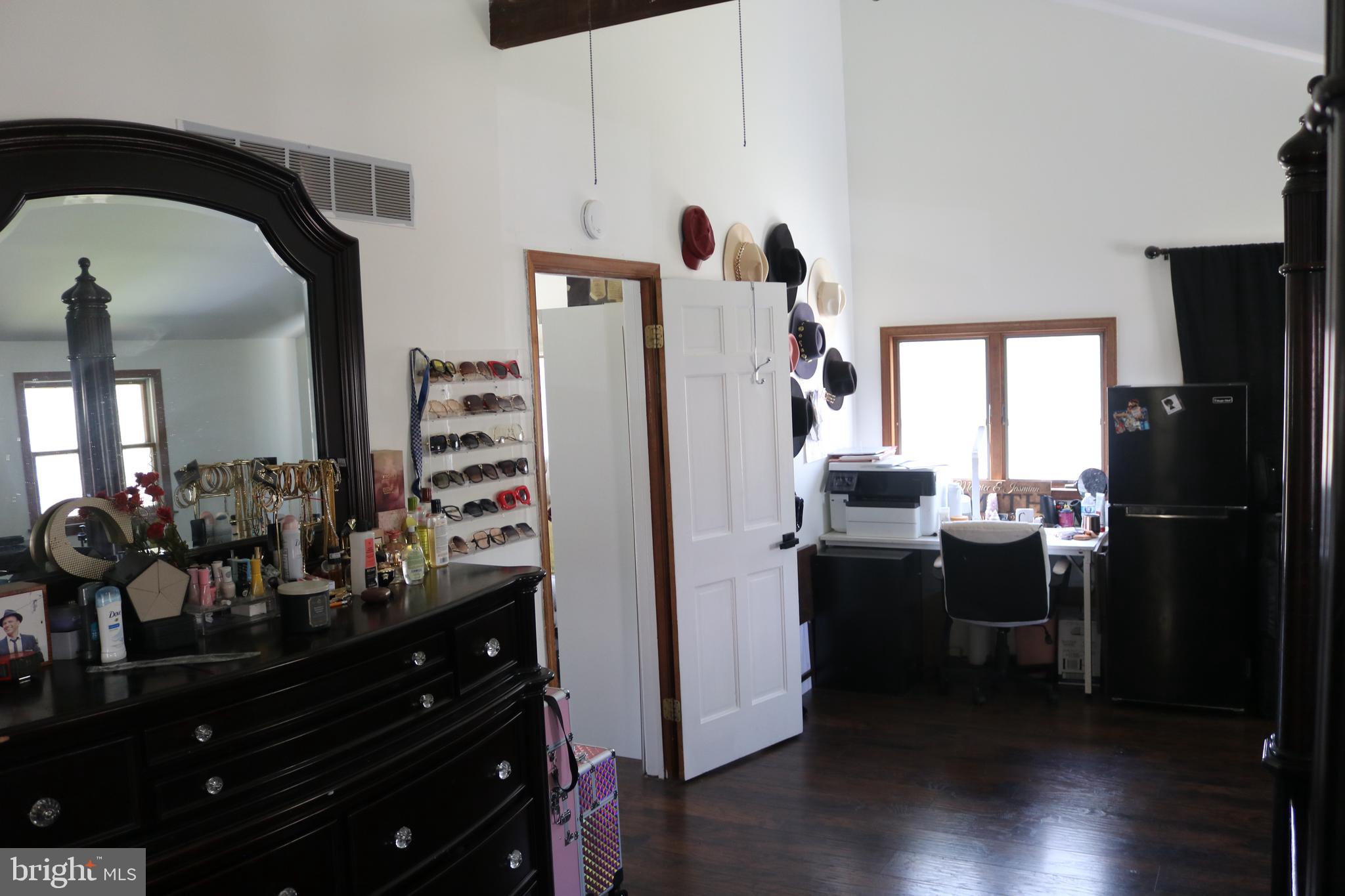 770 Whitehall Road Newfield, NJ 08344 - Photo 39 of 56 a kitchen with a refrigerator and a stove top oven