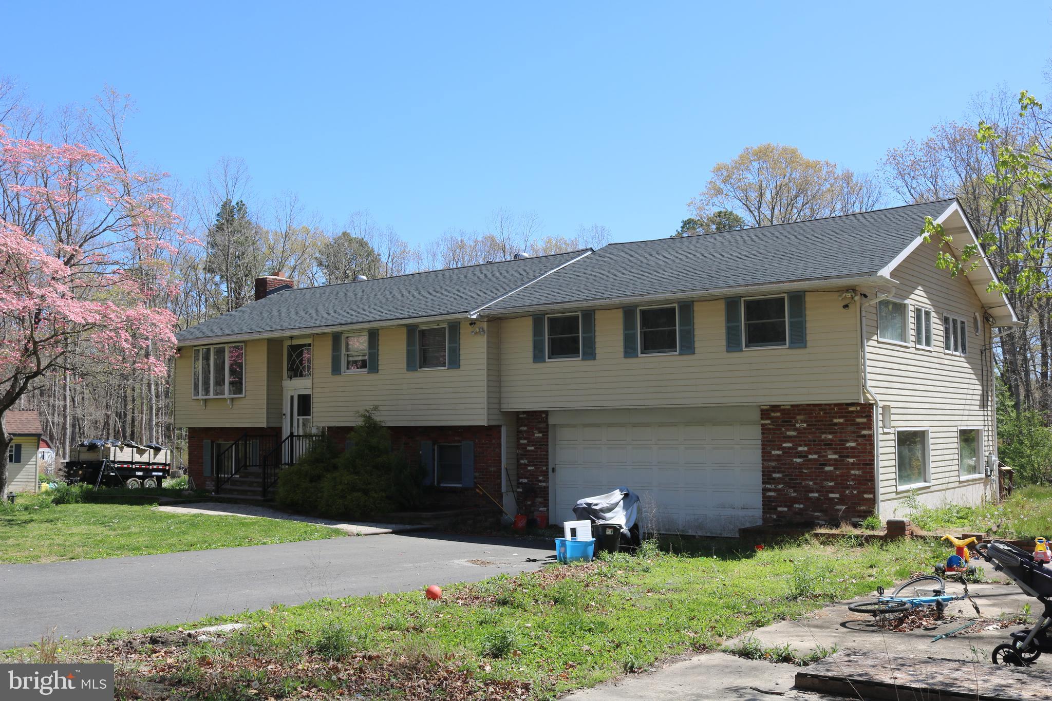 770 Whitehall Road Newfield, NJ 08344 - Photo 9 of 56 a front view of a house with garden