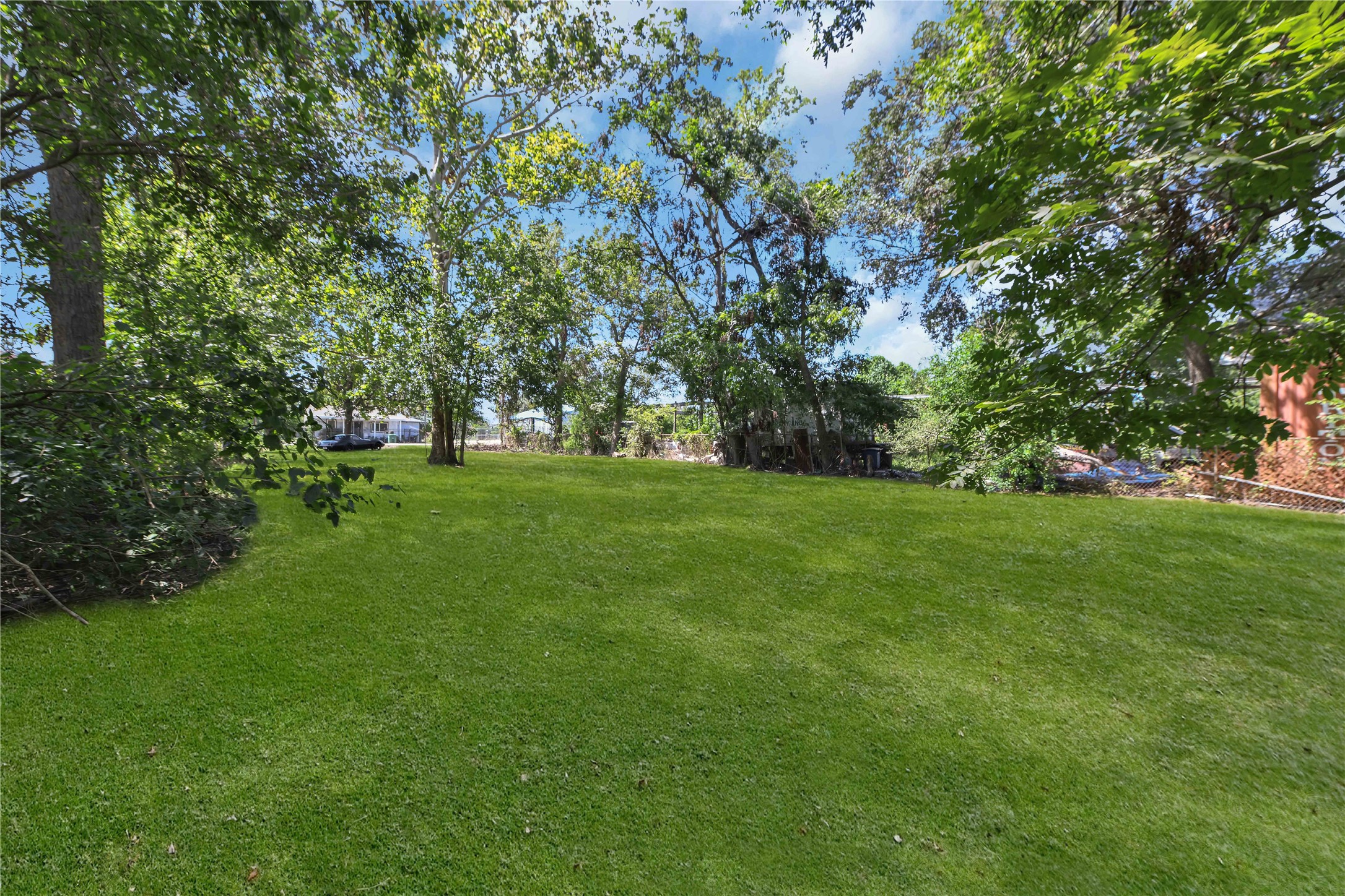 3914 Wipprecht Street Houston, TX 77026 - Photo 4 of 13 a view of grassy field with benches and trees all around
