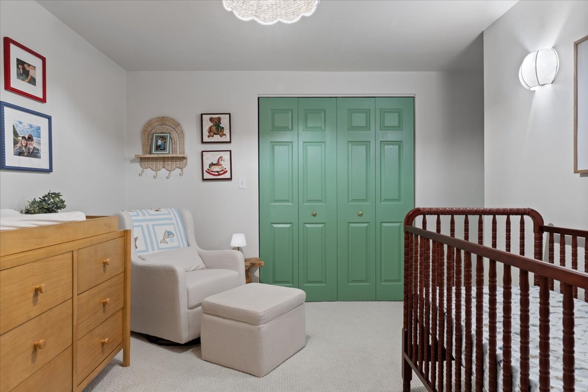 1946 North Seminary Avenue, Unit 1 Chicago, IL 60614 - Photo 18 of 20 a bathroom with a toilet sink and mirror